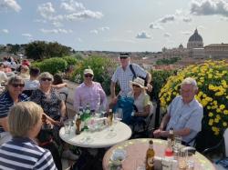 Celebratory Drinks on rooftop bar overlooking Rome